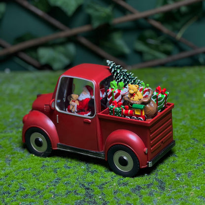 XMAS SANTA IN RED CAR WITH LED LIGHT SHOWPIECE