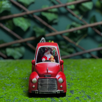 XMAS SANTA IN RED CAR WITH LED LIGHT SHOWPIECE